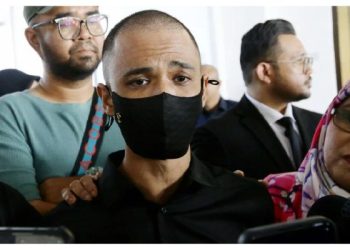 Along Cham Prostrates In Gratitude After Being Released Without Acquittal For Drug Charges